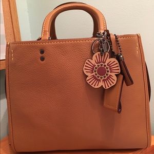Coach Tan Leather Satchel with Floral Charm